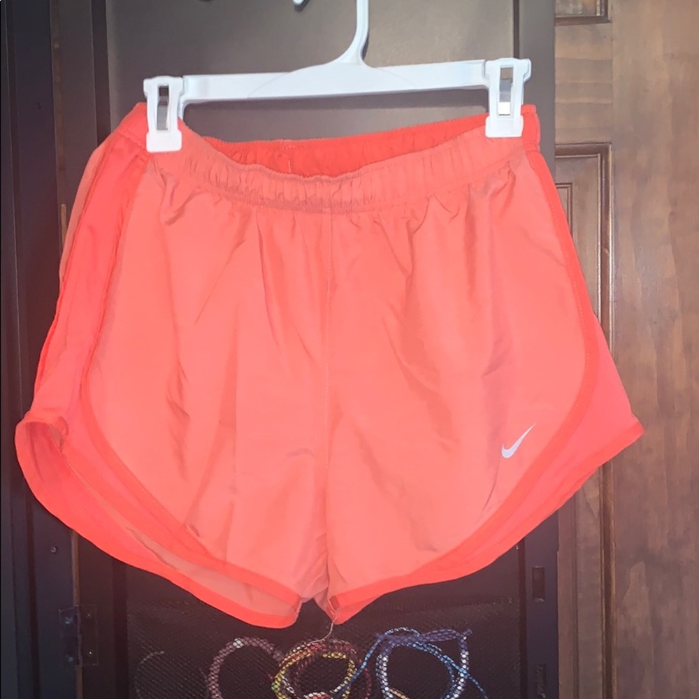 bright coral nike tempo running shorts